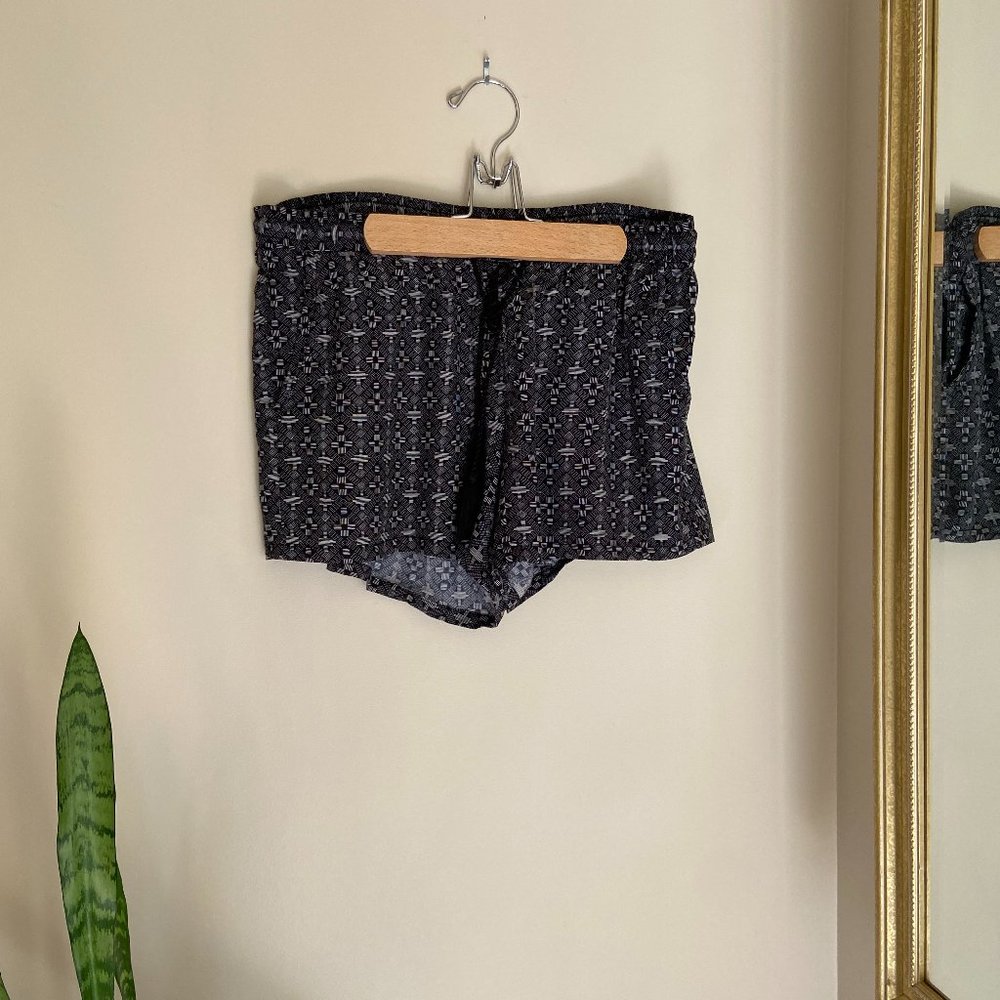Black shorts with white design